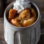 French toast in a mug with whipped cream