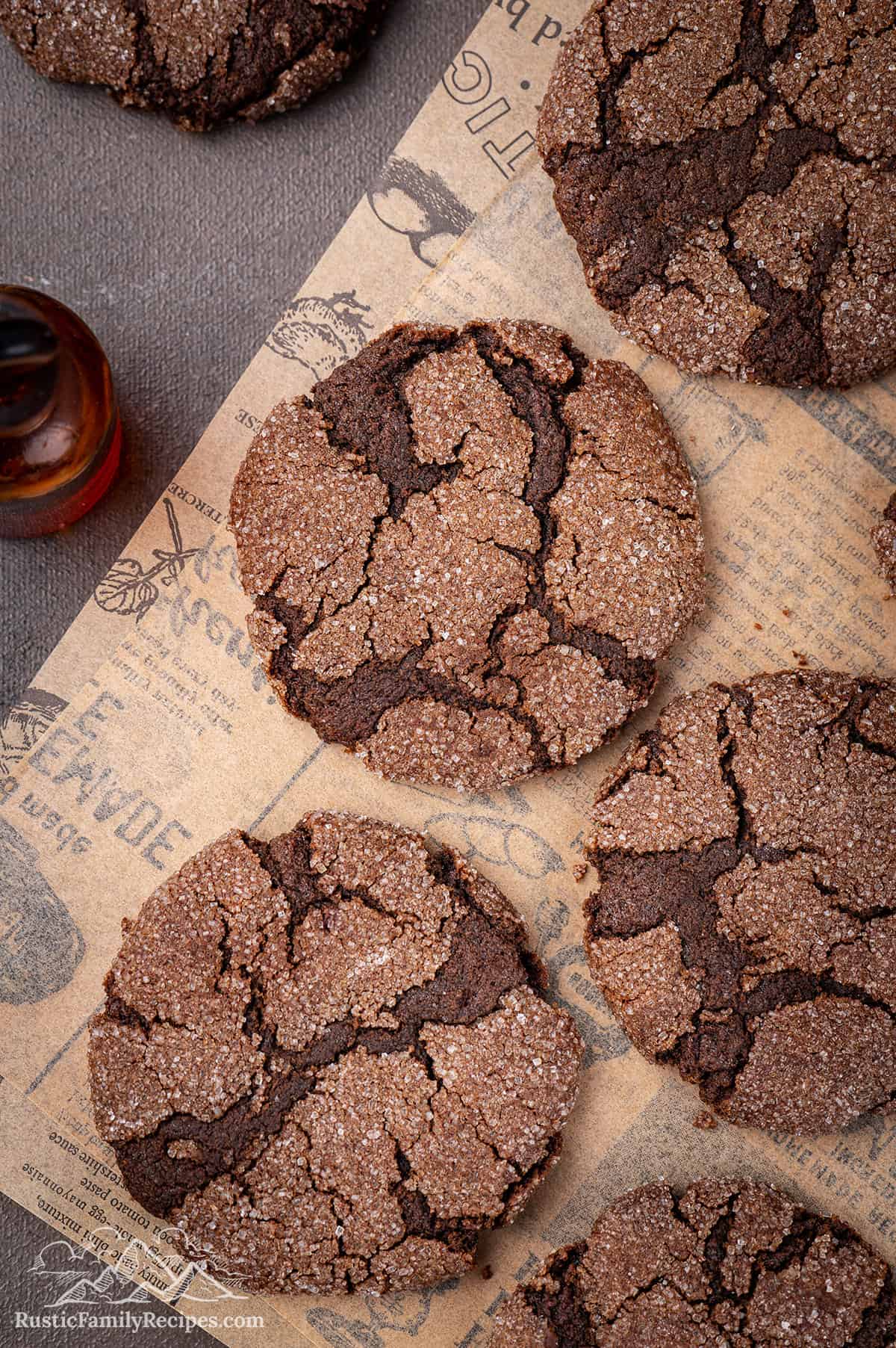 Chocolate sugar cookies cooling on parchment paper