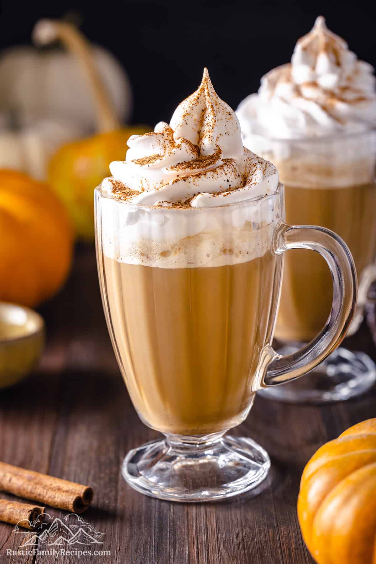 Homemade pumpkin spice lattes in two glasses