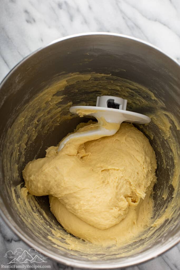 Cinnamon bun dough in a stand mixer bowl
