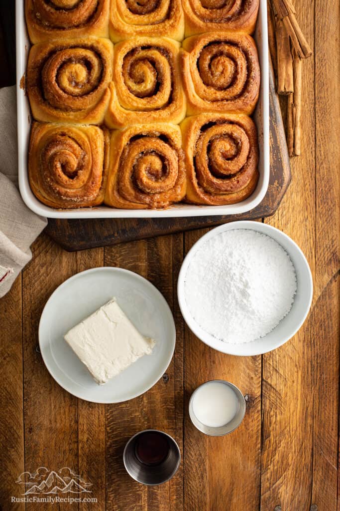 Baked cinnamon buns ready to be frosted