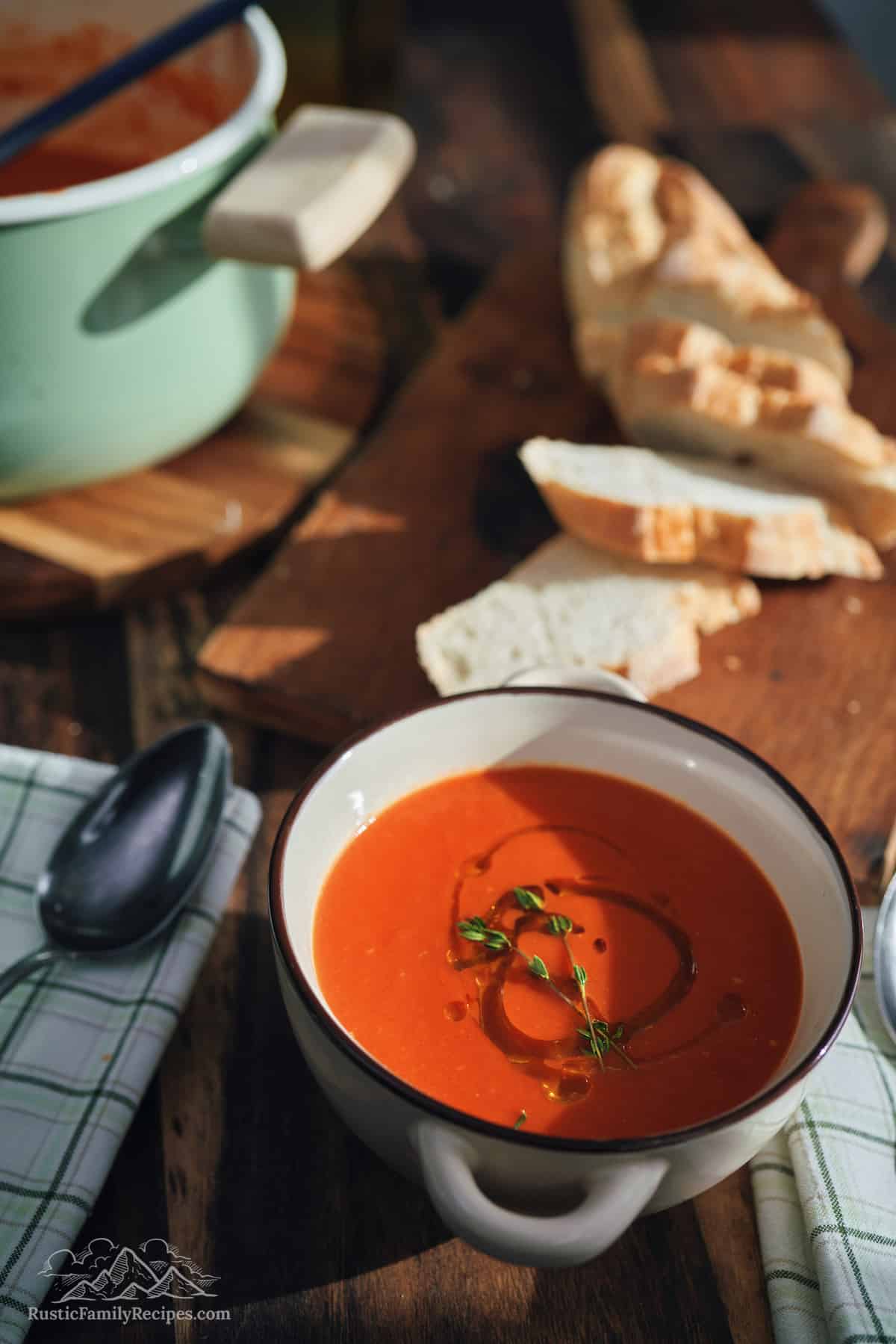 Bowl of tomato soup with olive oil.