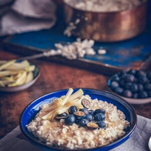Bowl of oatmeal with blueberries.