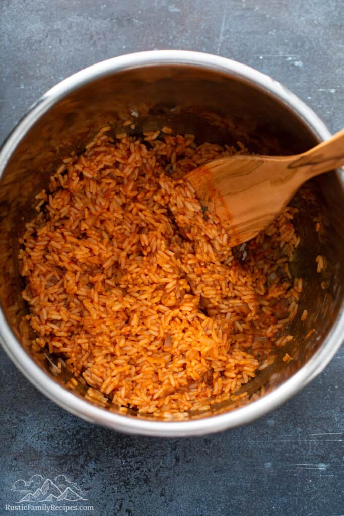 Cooked Mexican rice in a pot.