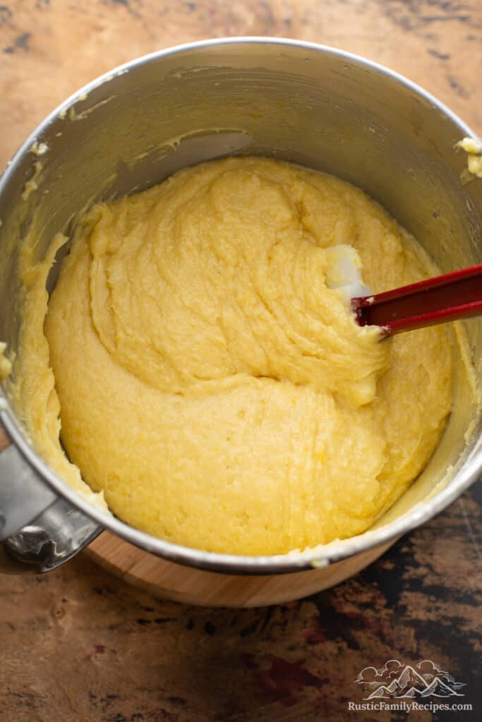 Vanilla cake batter in a stand mixer bowl