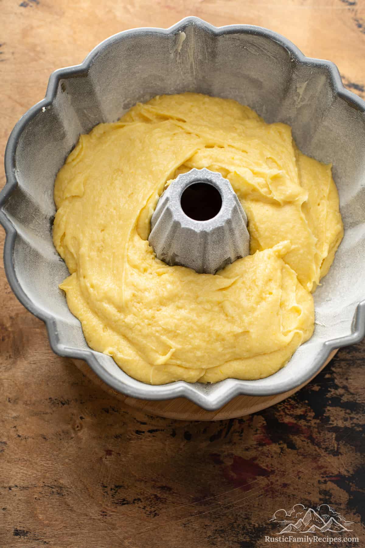Vanilla cake batter in a bundt pan.