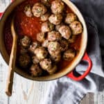 Turkey meatballs in a dutch oven with pasta sauce