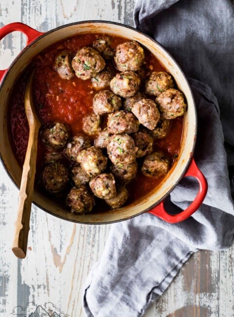 Turkey meatballs in a dutch oven with pasta sauce