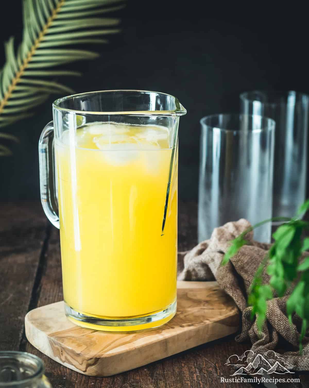 A pitcher of fresh mango lemonade