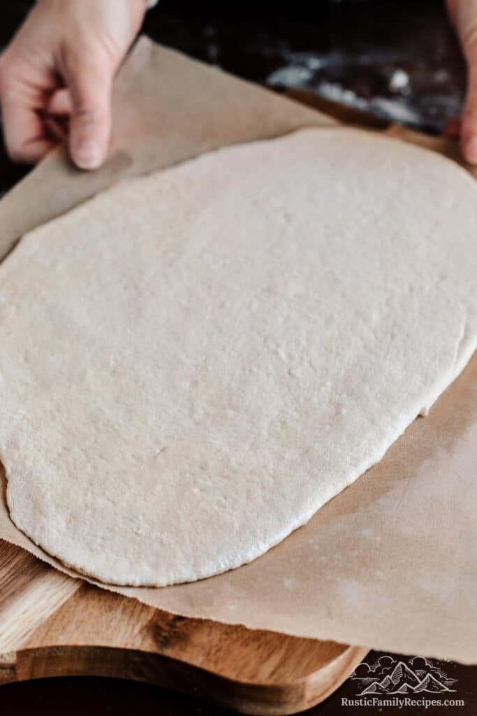 Rolled out sourdough pizza dough