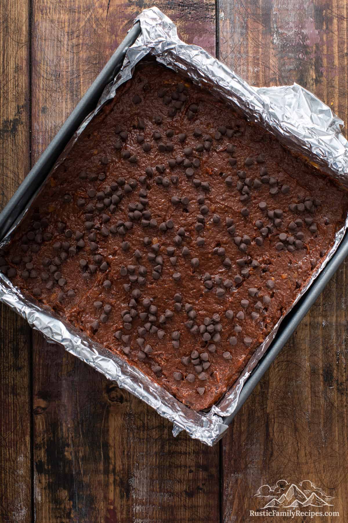Brownie batter in a pan ready to bake