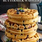 A stack of Blueberry Buttermilk Waffles on a plate.