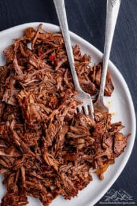 Shredded birria taco meat on a plate