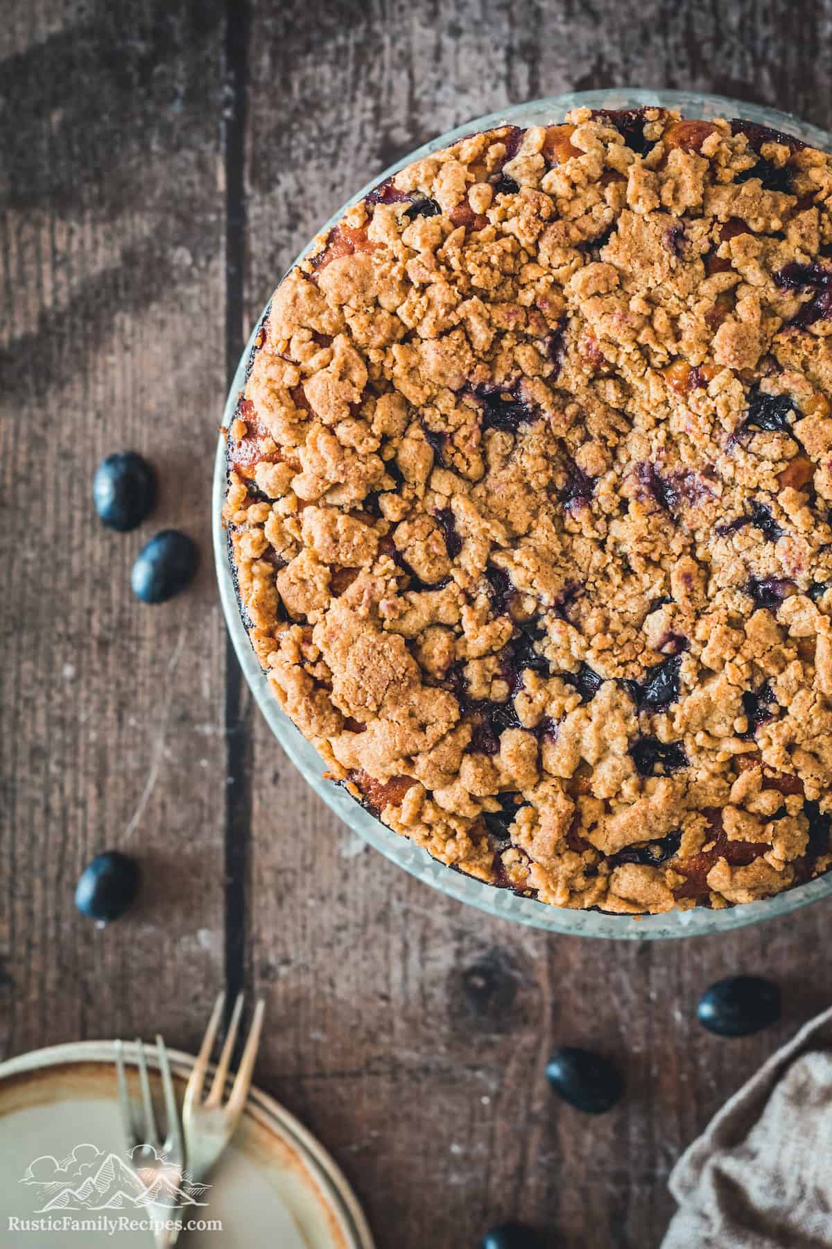 Top view of a black currant cake with streusel topping