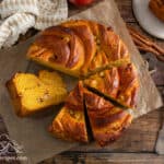 Overhead shot of Pumpkin Apple Apricot Bread on parchment paper