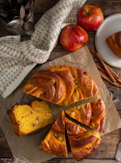 Overhead shot of Pumpkin Apple Apricot Bread cut into wedges