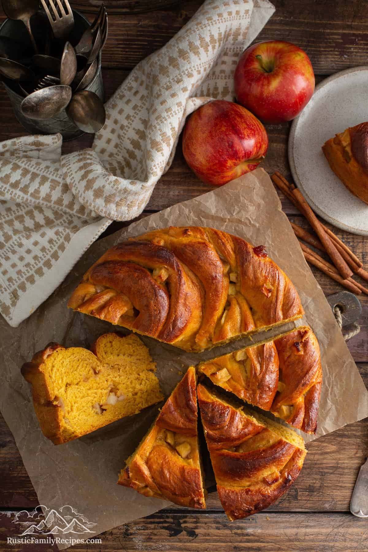 Overhead shot of Pumpkin Apple Apricot Bread cut into wedges