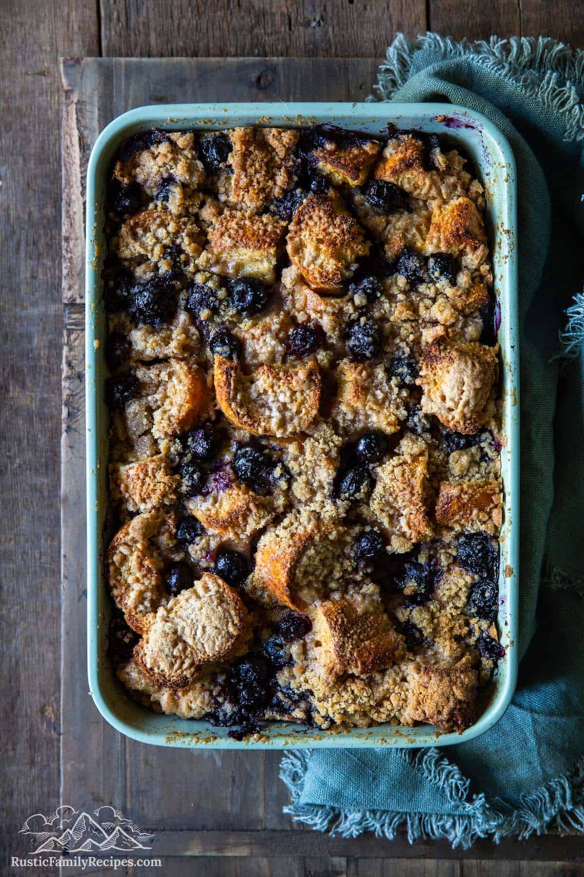 Blue casserole dish with blueberry french toast