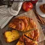 Overhead shot of Pumpkin Apple Apricot Bread cut into wedges