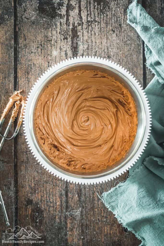 Overhead view of Nutella buttercream in mixing bowl