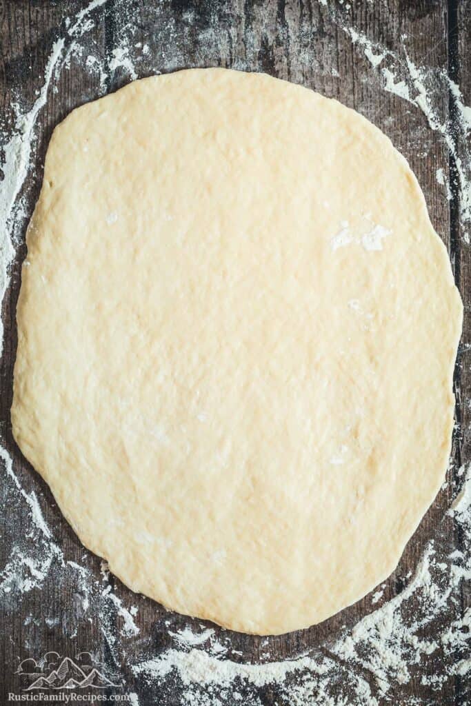 Overhead view of rolled out donut dough
