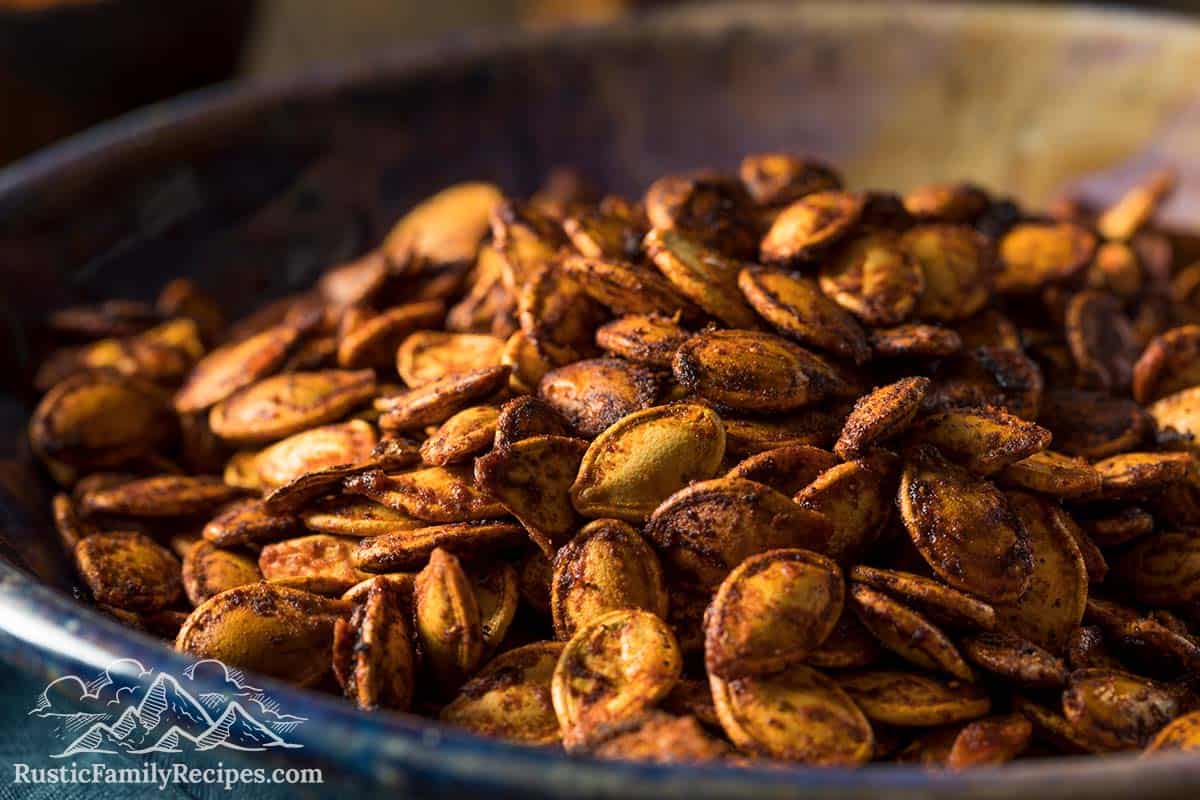 Close up of roasted pumpkin seeds in a bowl