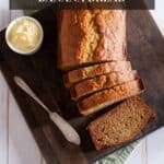 Sourdough banana bread sliced on a wood cutting board