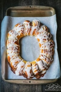 Swedish tea ring on a baking sheet with parchment paper
