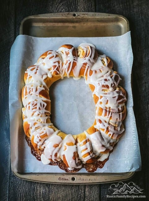 Swedish tea ring on a baking sheet with parchment paper