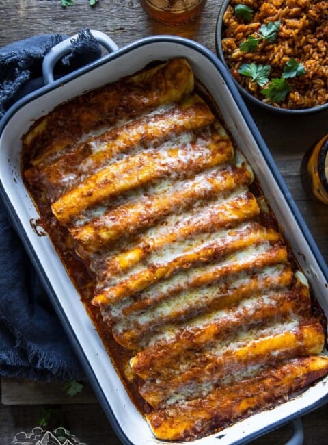 Cheesy enchiladas in a baking dish