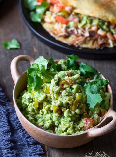 A bowl filled with homemade guacamole