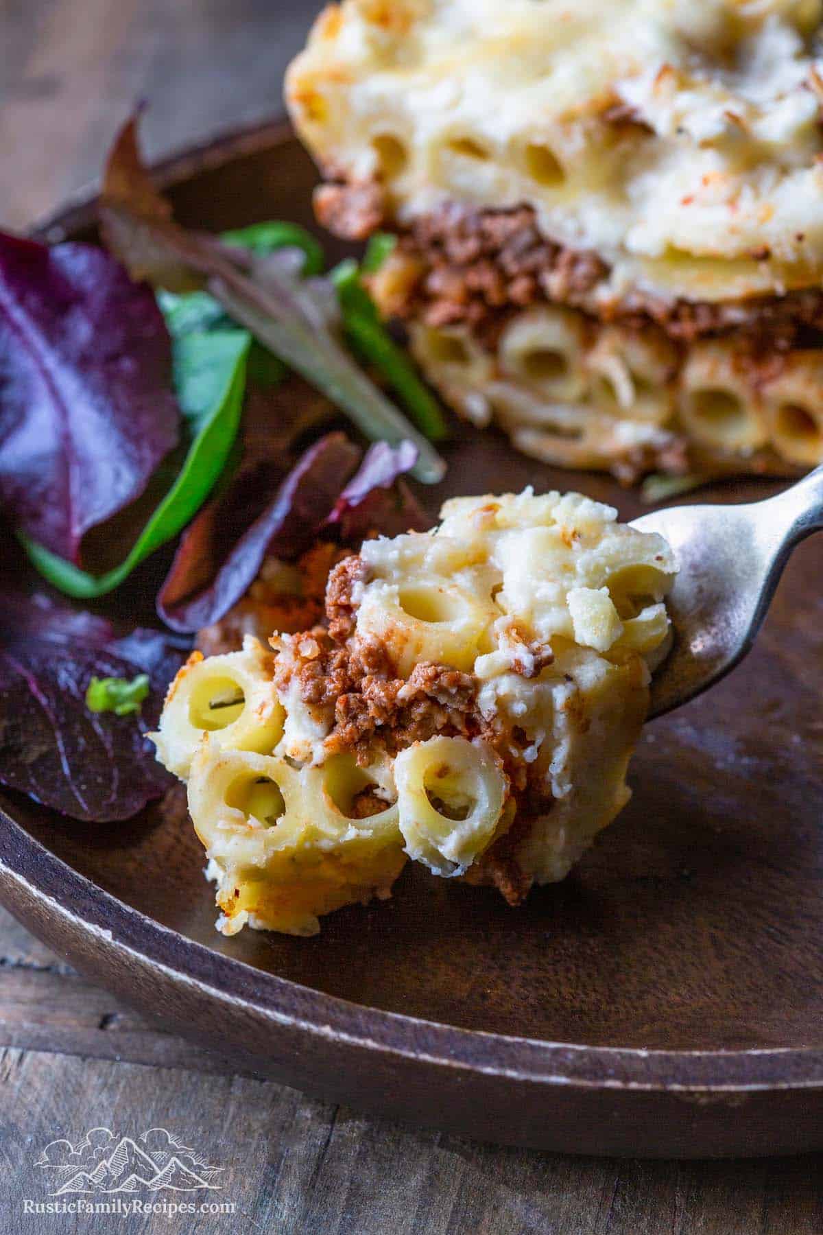 A forkful of Greek pastitsio pasta.