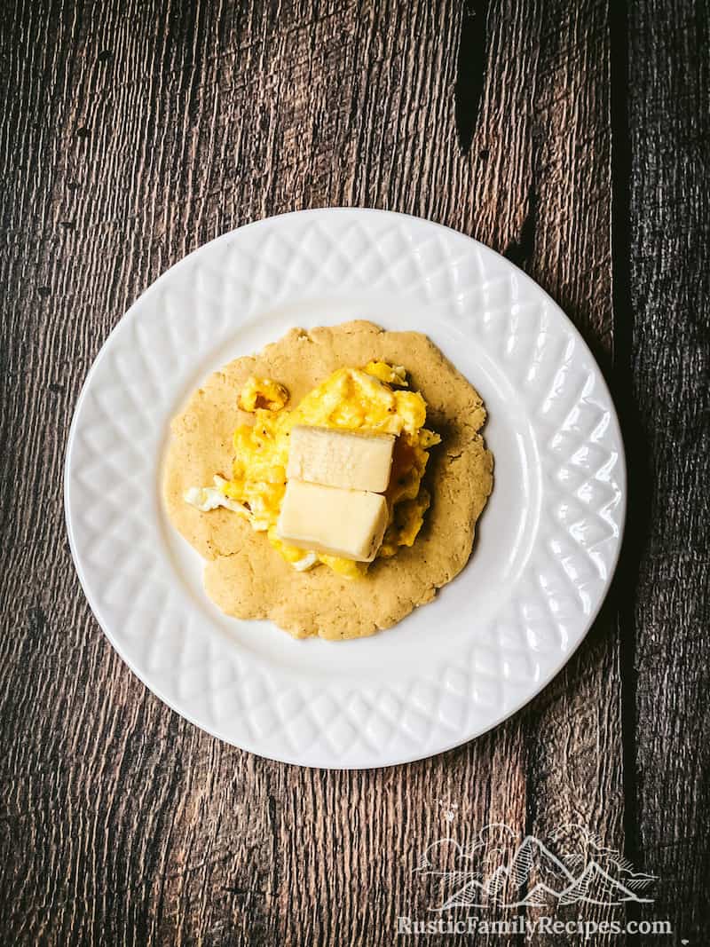 Masa dough with scrambled eggs and cheese