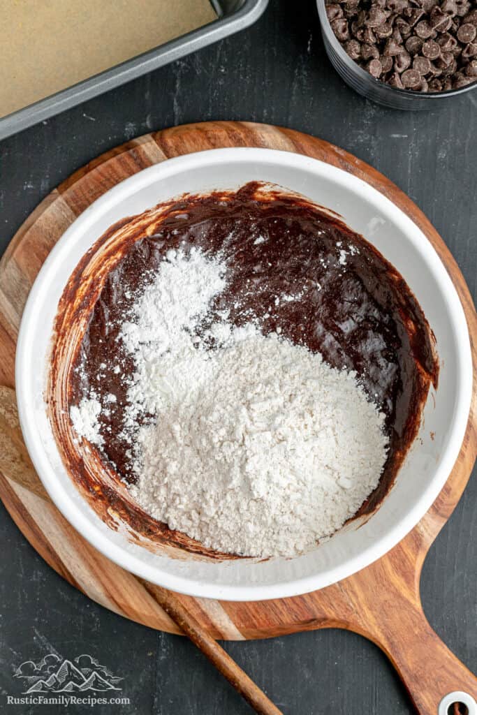 The dry ingredients in a large mixing bowl before they've been combined with the brownie batter