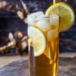 John Daly drink in a high ball glass with lemon wedges