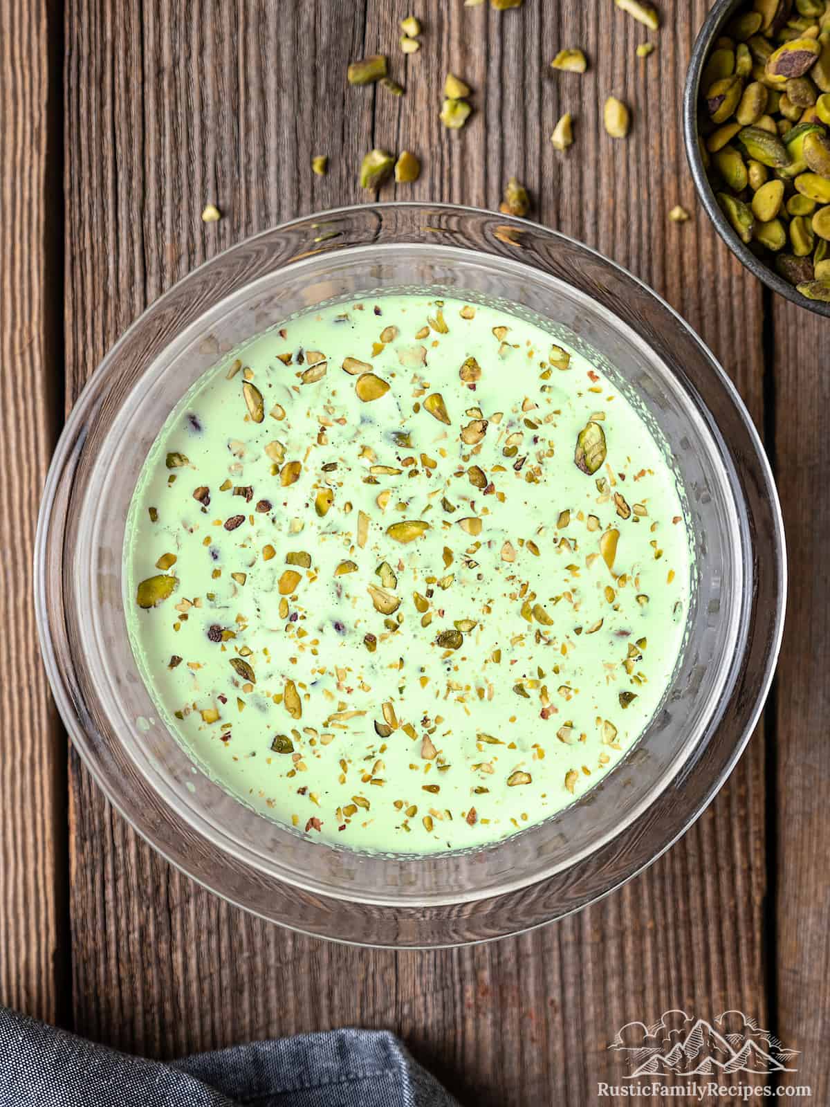 Top view of a bowl of pistachio ice cream mixture.