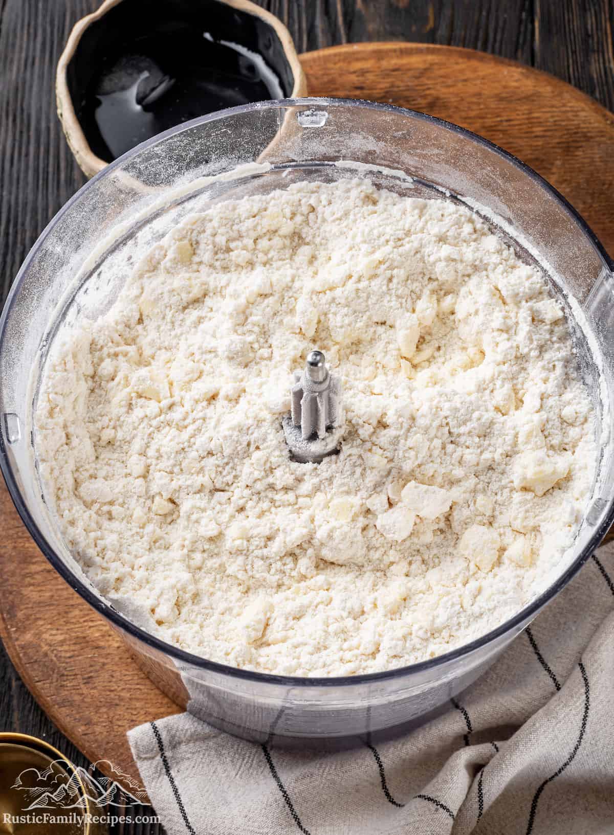 Food processor with pie dough being made