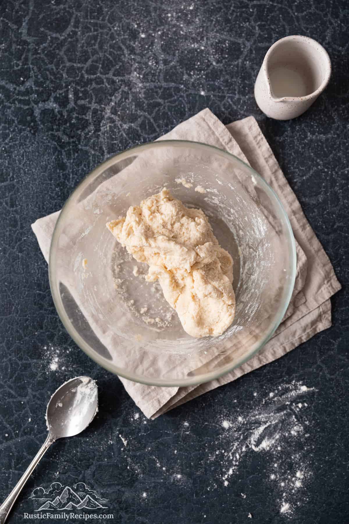 Biscuit dough in a mixing bowl.