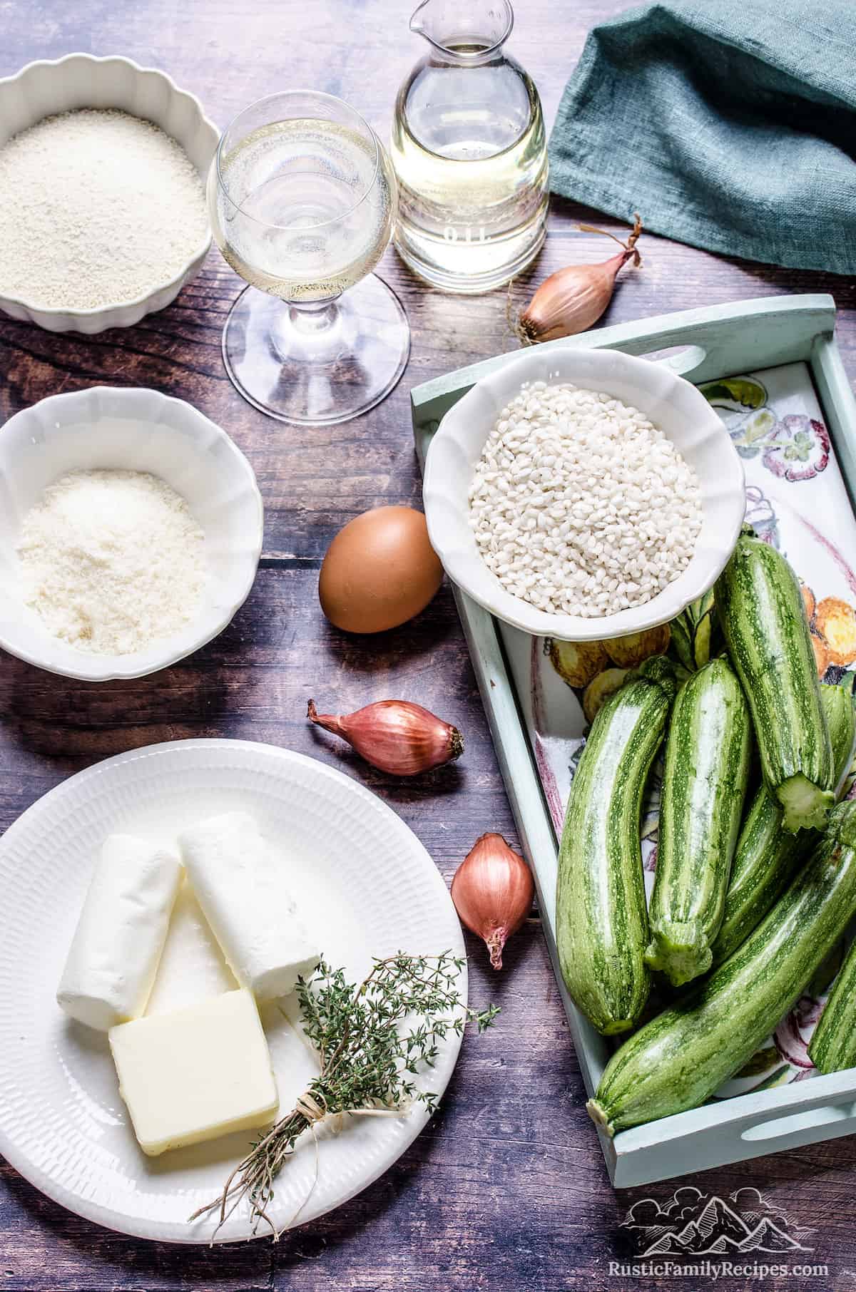 The ingredients for homemade arancini with zucchini and goat cheese.