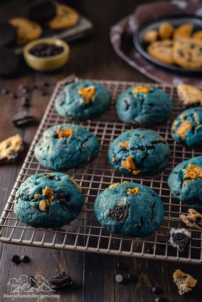 Blue cookie monster cookies cooling on a wire rack