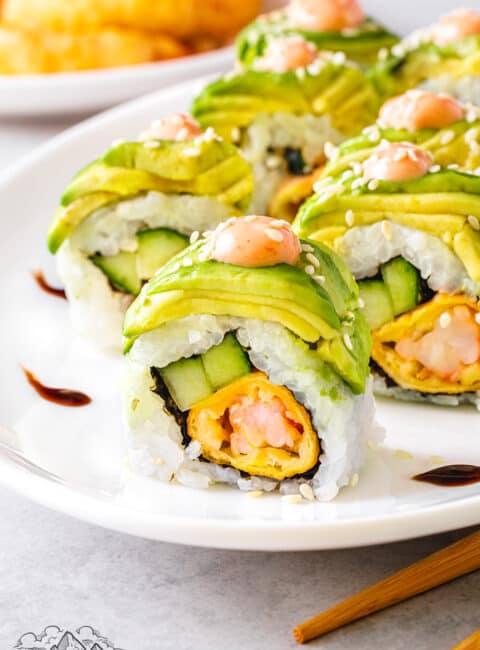Dragon roll sushi on a white plate