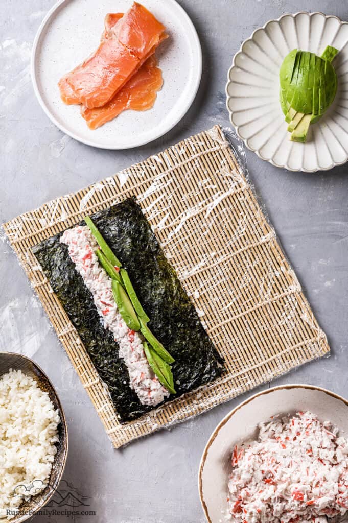 Nori with sushi rice, crab and avocado