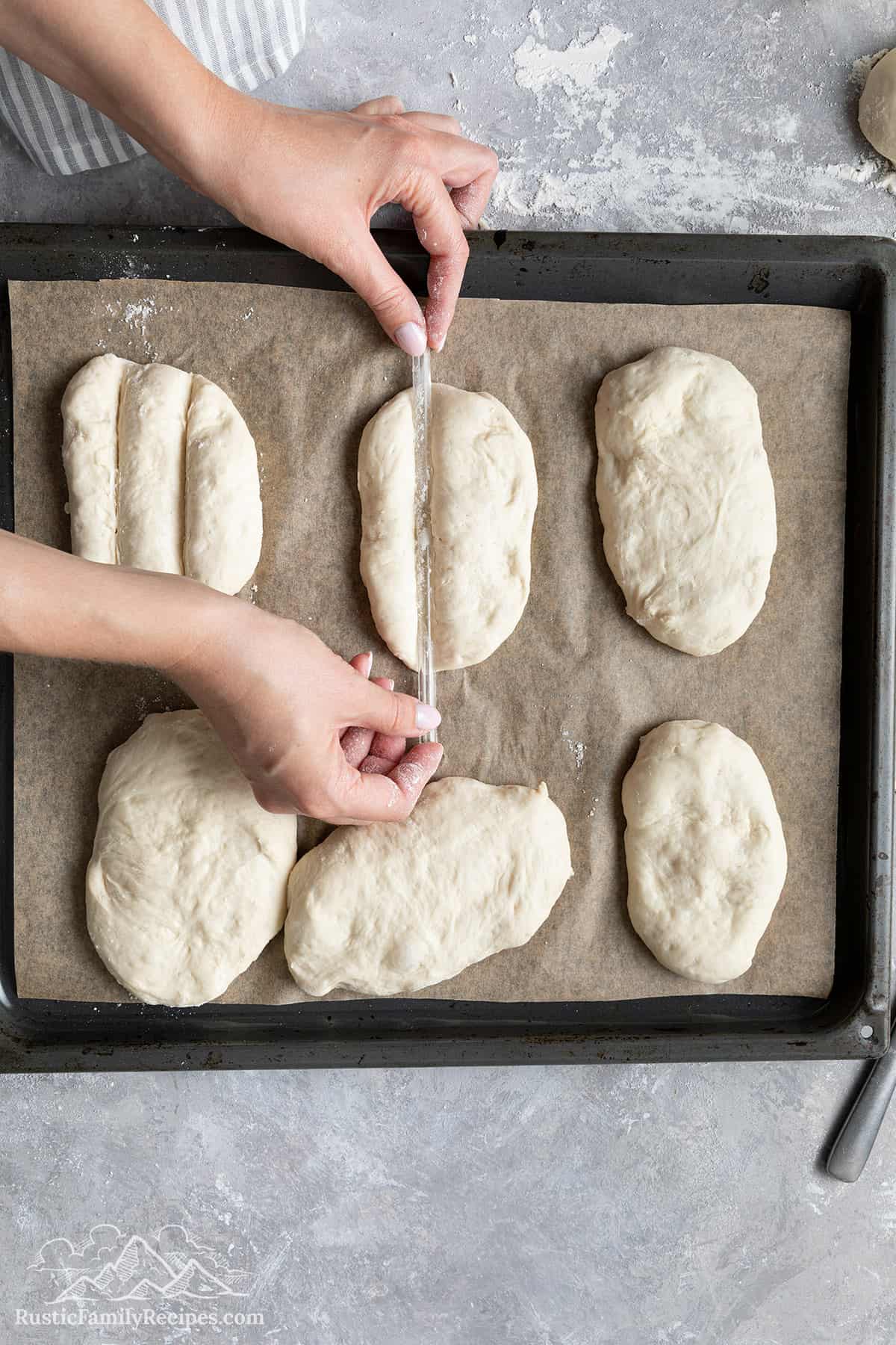 Shaping the dough with a straw.