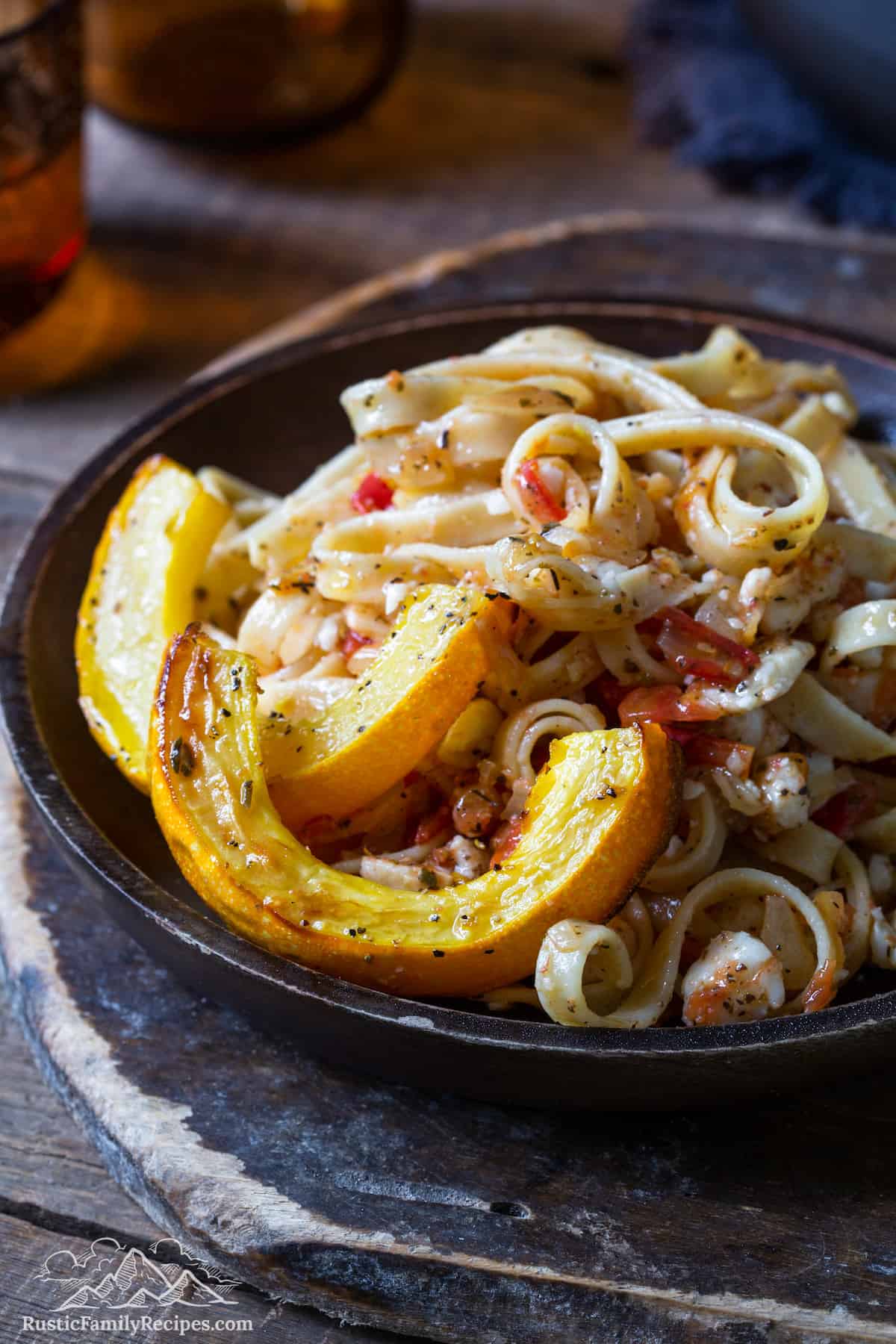 Roasted delicata squash served with goat cheese pasta