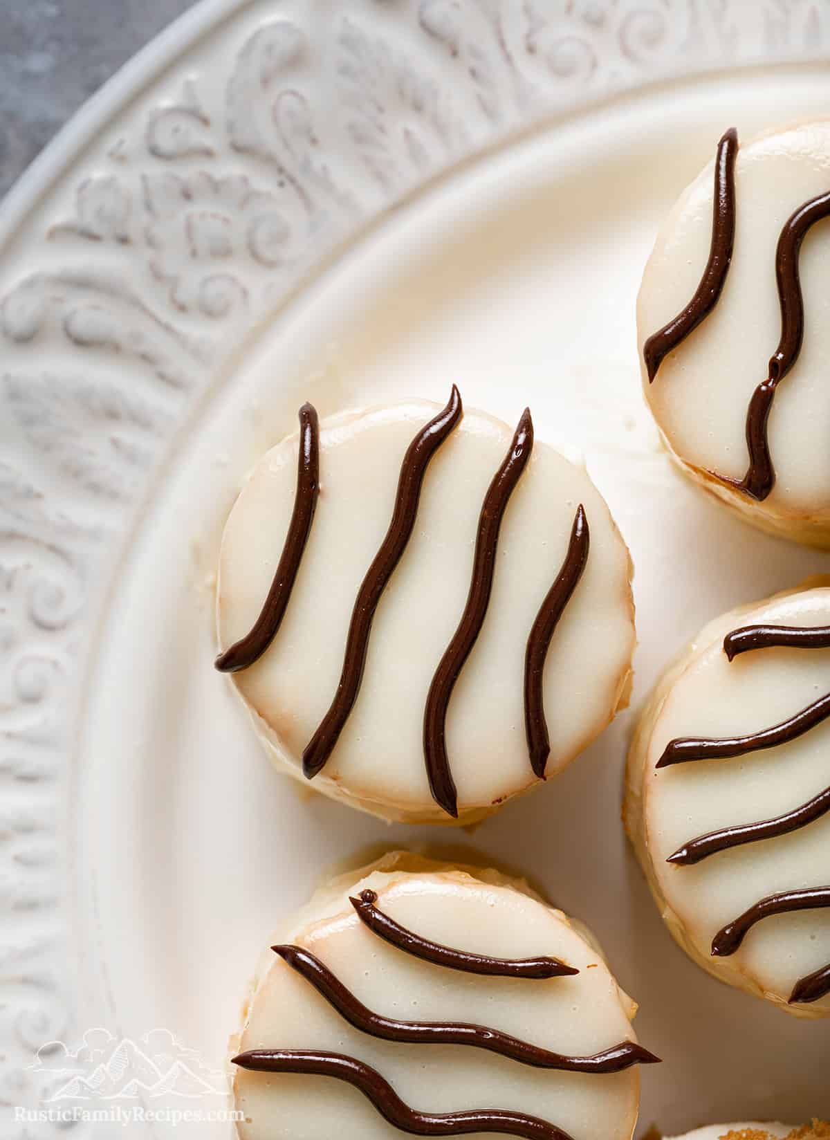 Close-up image of zebra cakes on a plate.
