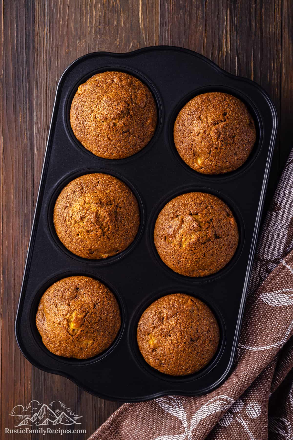 6 baked muffins in a jumbo muffin tin
