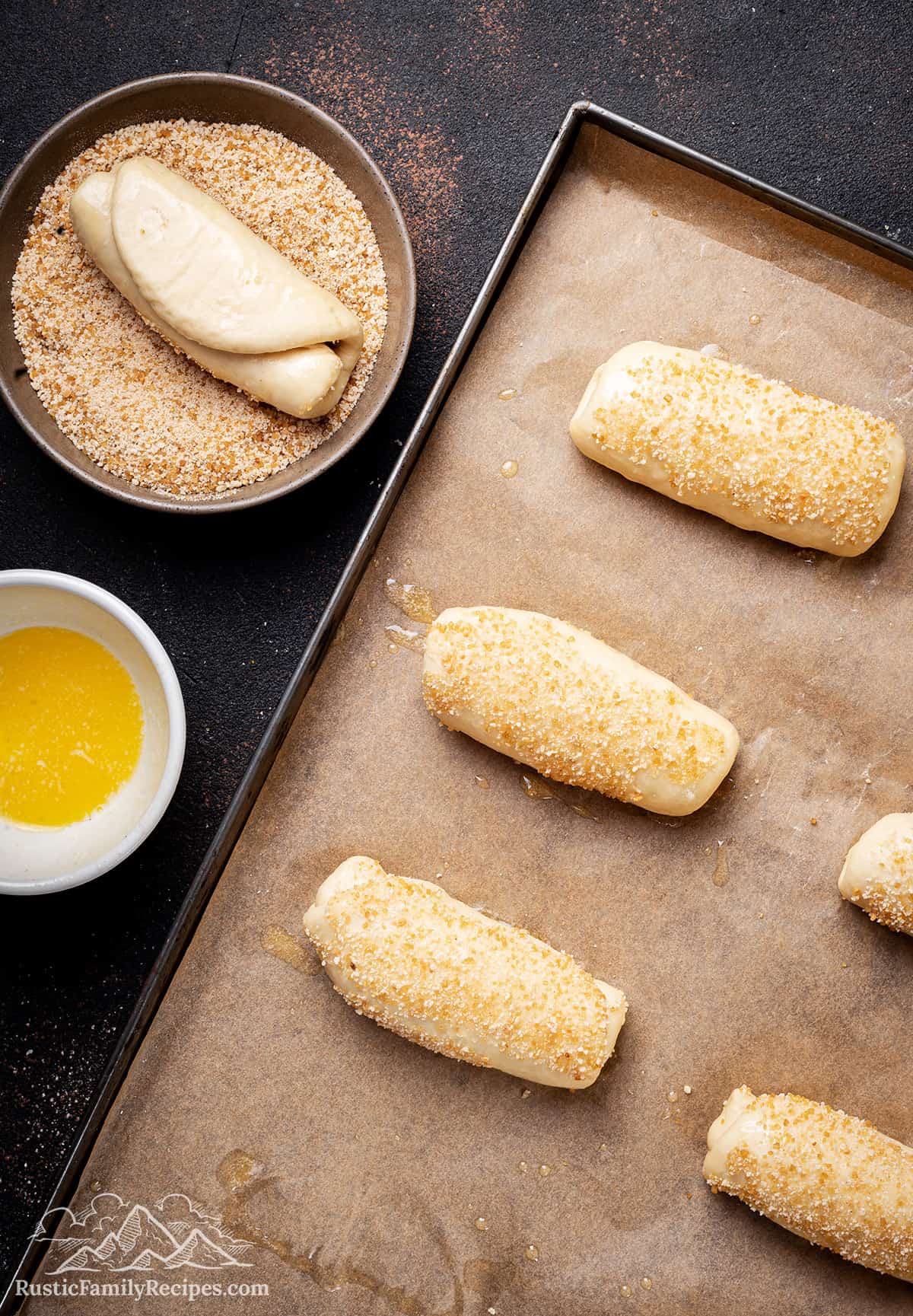 Assembled senorita bread rolls ready to bake on a baking sheet