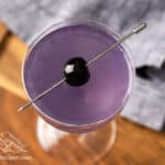 Purple Aviation cocktail with a luxardo cherry