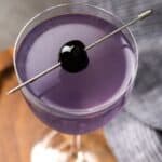 Purple Aviation cocktail with a luxardo cherry