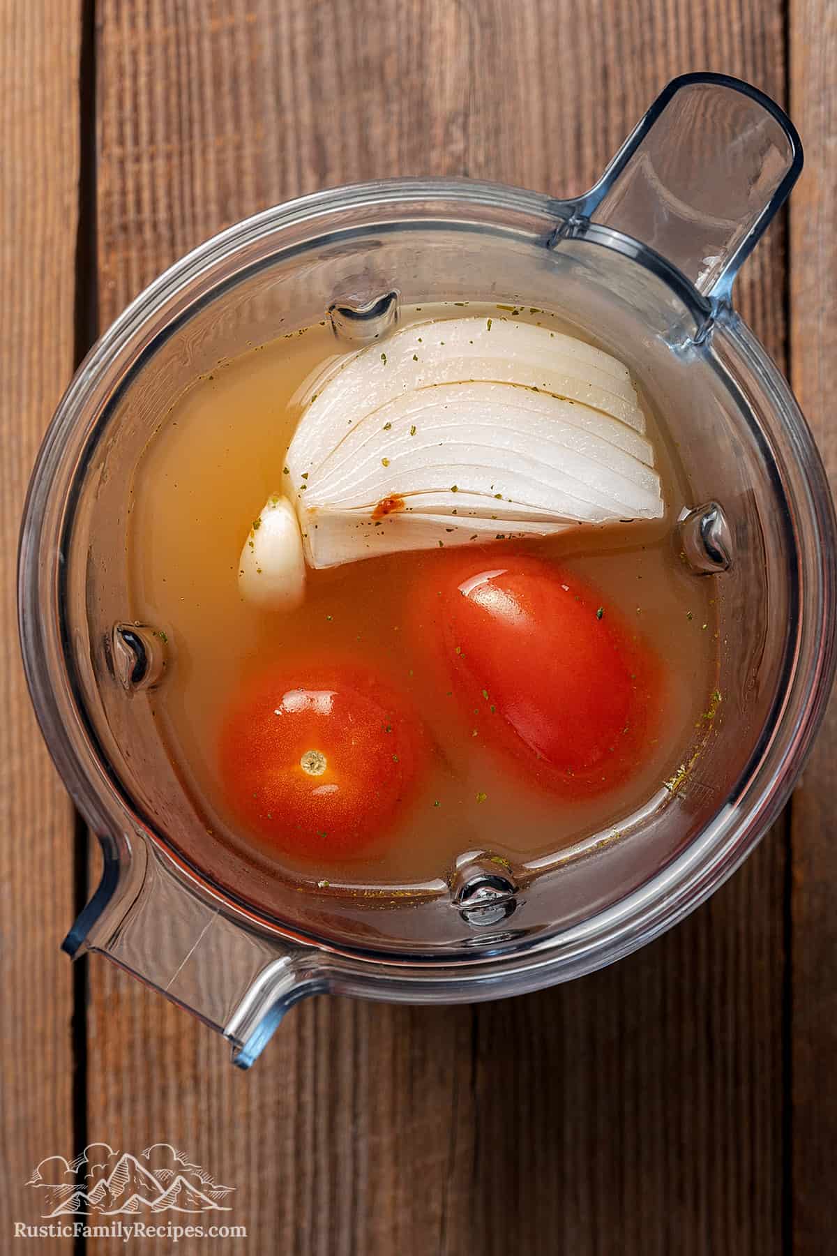 Tomatoes and onion in a blender